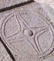 A Brief Look At Tomorrow - The symbol of Baal carved in stone - A Brief Look At Tomorrow